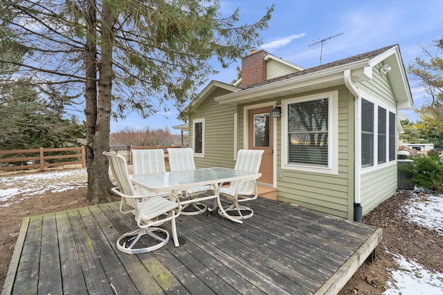 view of snow covered deck