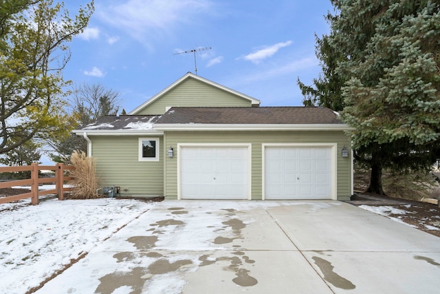 view of snow covered garage