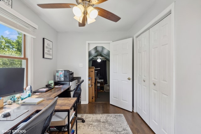 home office with dark hardwood / wood-style floors and ceiling fan