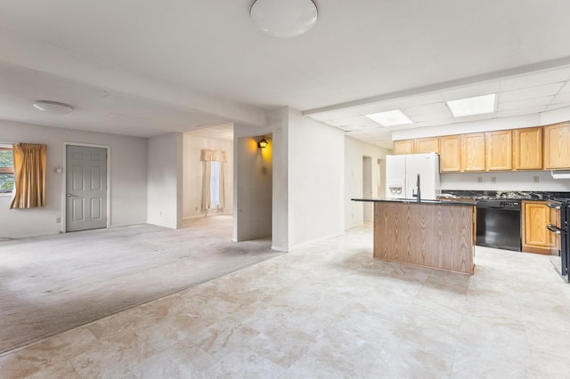 kitchen with light colored carpet, a center island with sink, dishwasher, stainless steel stove, and white fridge with ice dispenser