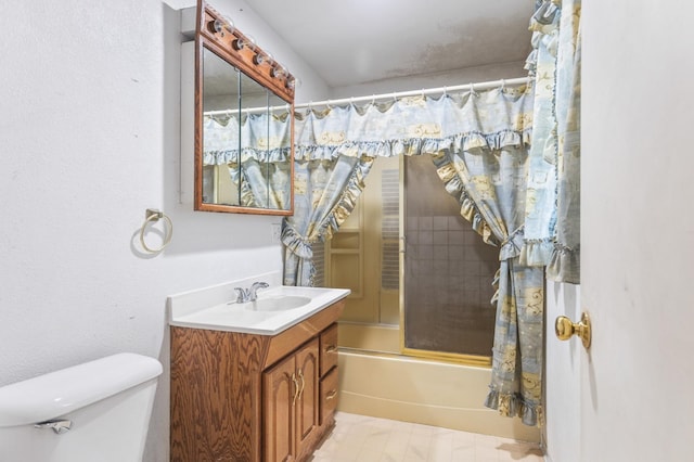 full bathroom with shower / bath combination with glass door, vanity, and toilet