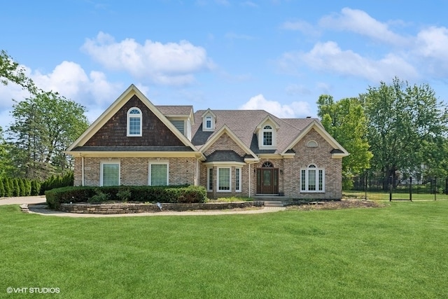 craftsman-style house featuring a front lawn