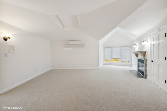 unfurnished living room with light carpet, lofted ceiling, and a high end fireplace