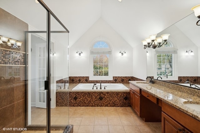 bathroom featuring plus walk in shower, tile patterned flooring, vaulted ceiling, an inviting chandelier, and vanity