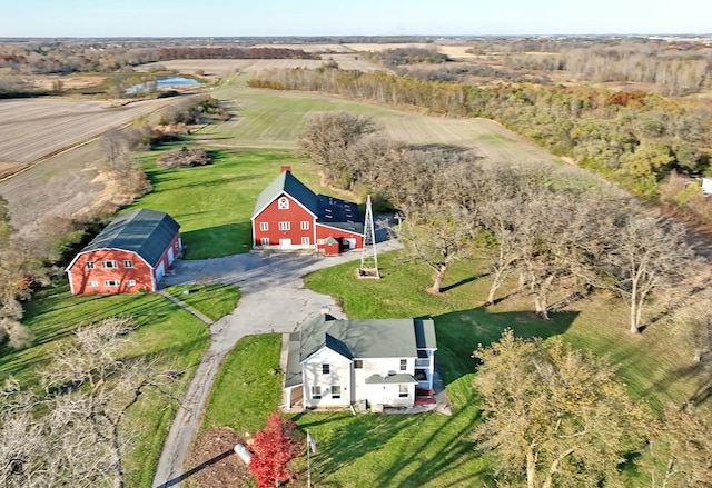 birds eye view of property featuring a rural view