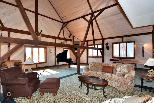 living room with wooden ceiling, high vaulted ceiling, wooden walls, beam ceiling, and carpet floors