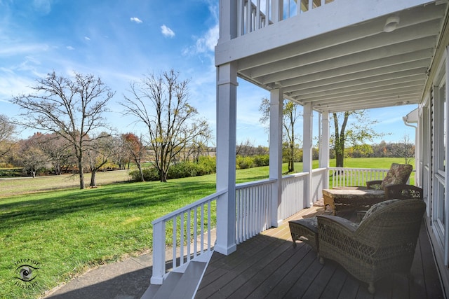 deck with a lawn and covered porch