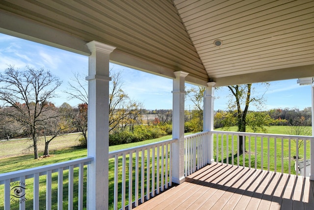 deck featuring a yard