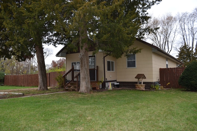 exterior space with a front lawn