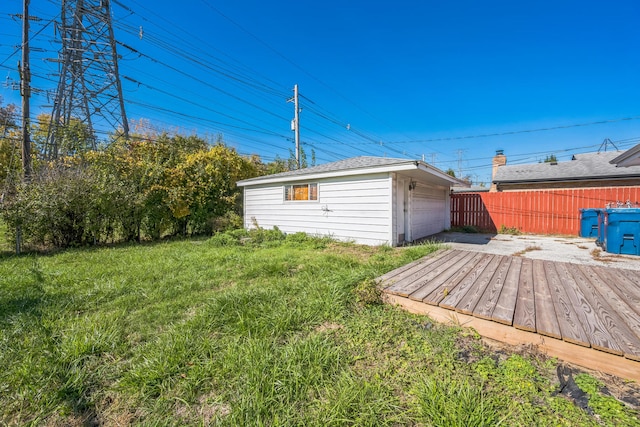 view of outbuilding featuring a lawn