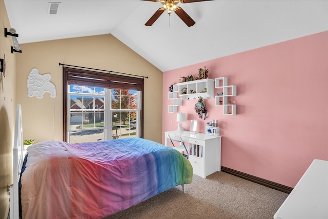 carpeted bedroom featuring ceiling fan and vaulted ceiling