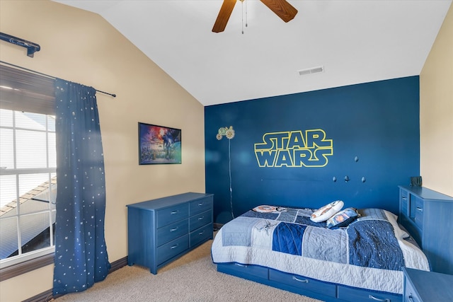 carpeted bedroom with lofted ceiling and ceiling fan