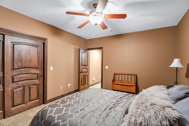 bedroom with baseboard heating, carpet floors, and ceiling fan