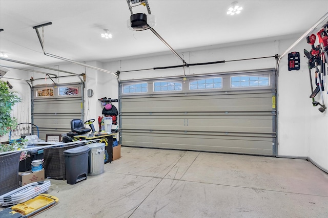 garage featuring a garage door opener