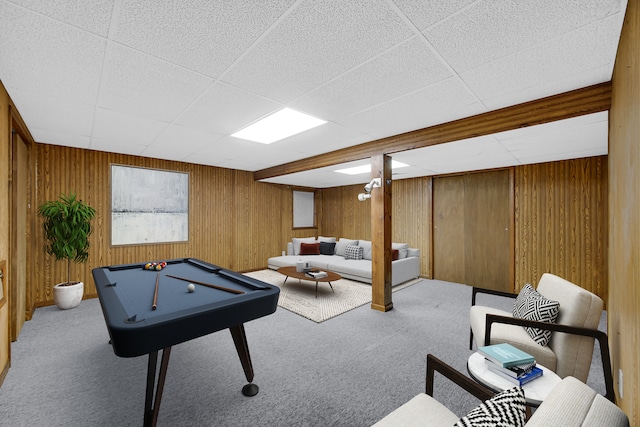 rec room featuring a paneled ceiling, light carpet, billiards, and wooden walls