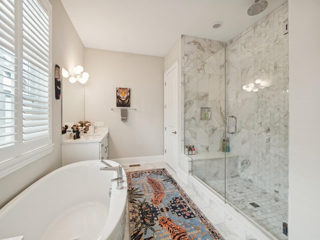 bathroom featuring vanity and plus walk in shower