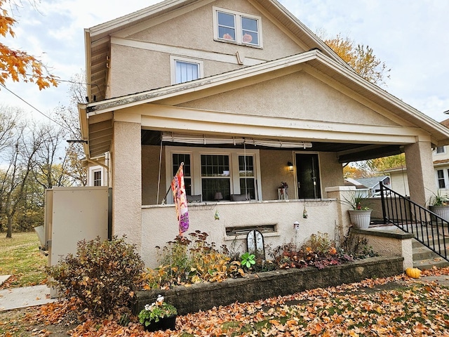 view of front of home featuring covered porch