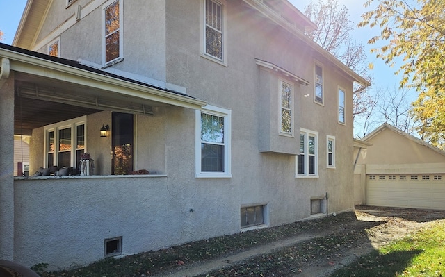 view of property exterior featuring a garage