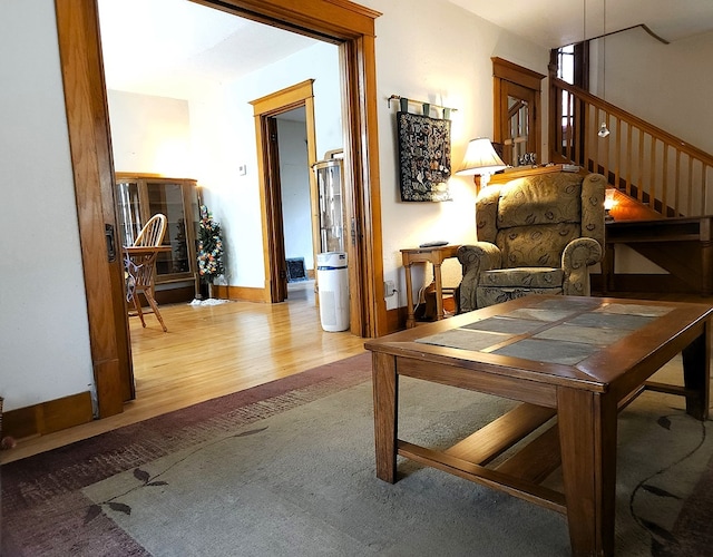 sitting room with hardwood / wood-style floors