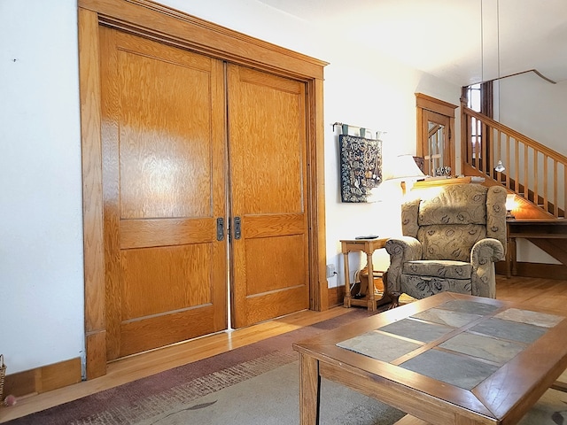 sitting room with hardwood / wood-style floors