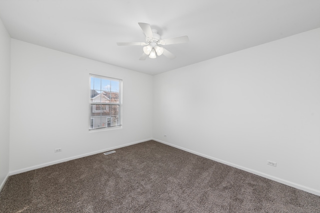 carpeted empty room with ceiling fan