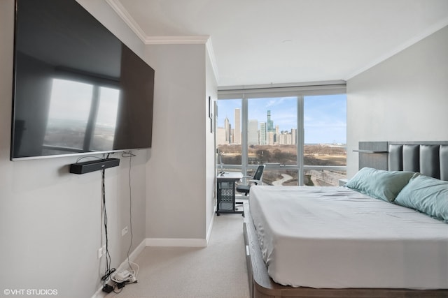 bedroom with crown molding and light colored carpet