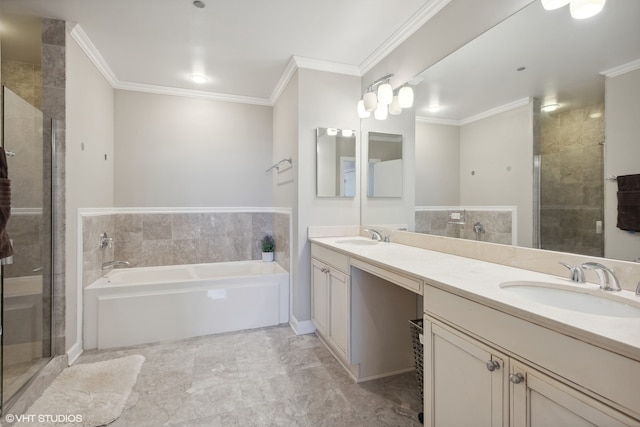 bathroom with vanity, ornamental molding, and separate shower and tub