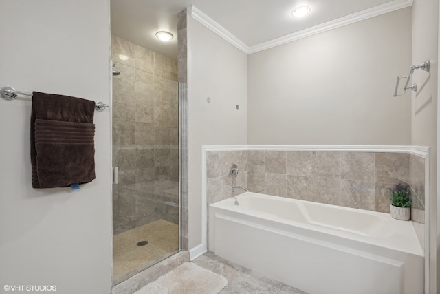 bathroom with independent shower and bath and crown molding