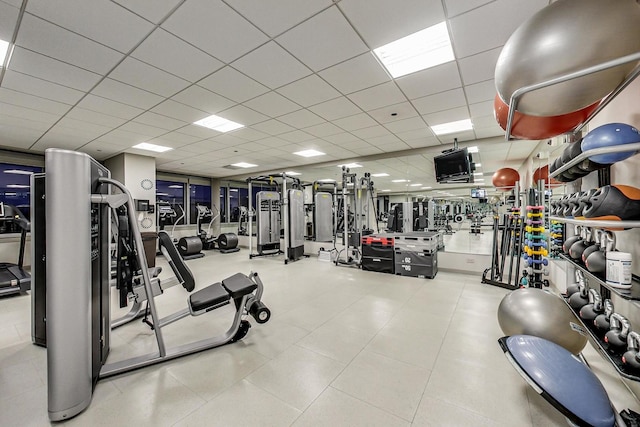 workout area featuring a drop ceiling