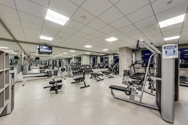 exercise room featuring a drop ceiling