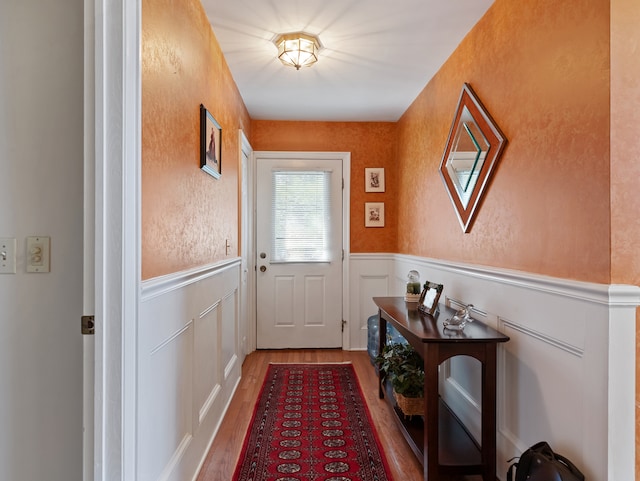 doorway to outside featuring hardwood / wood-style floors