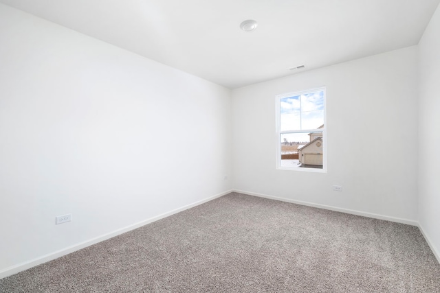 view of carpeted spare room