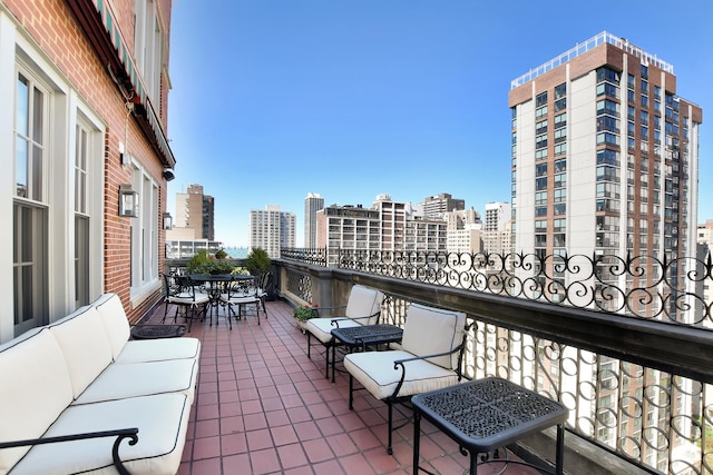 1320 N State Pkwy Unit 14-15Cd, Chicago, IL 60610 - balcony with a view of city and outdoor dining space