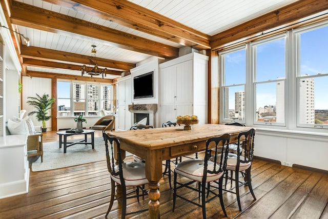 1320 N State Pkwy Unit 14-15Cd, Chicago, IL 60610 - dining space featuring hardwood / wood-style flooring, a fireplace, a chandelier, and wood ceiling with exposed beams