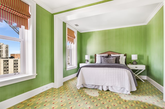 bedroom with crown molding