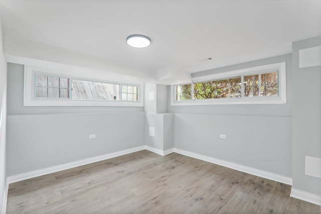 basement featuring light wood-type flooring