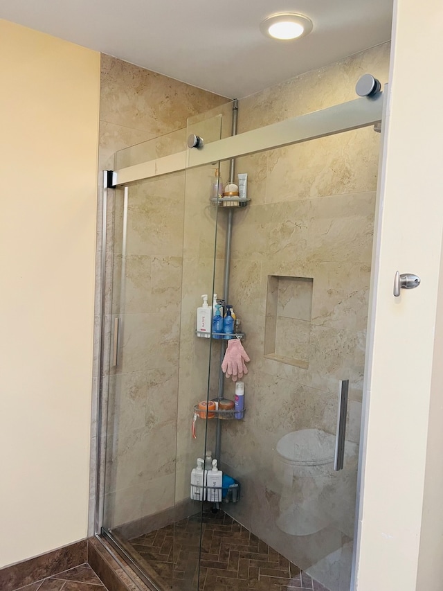 bathroom with an enclosed shower