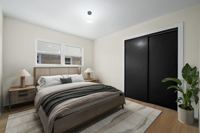 bedroom featuring light wood-type flooring