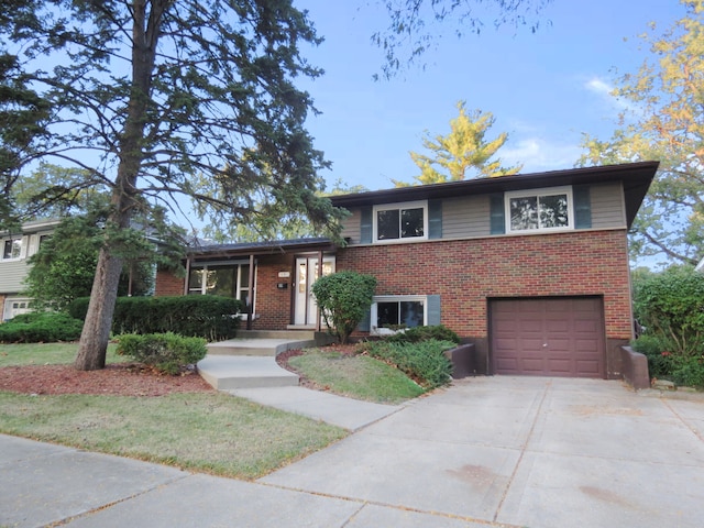 split level home with a garage