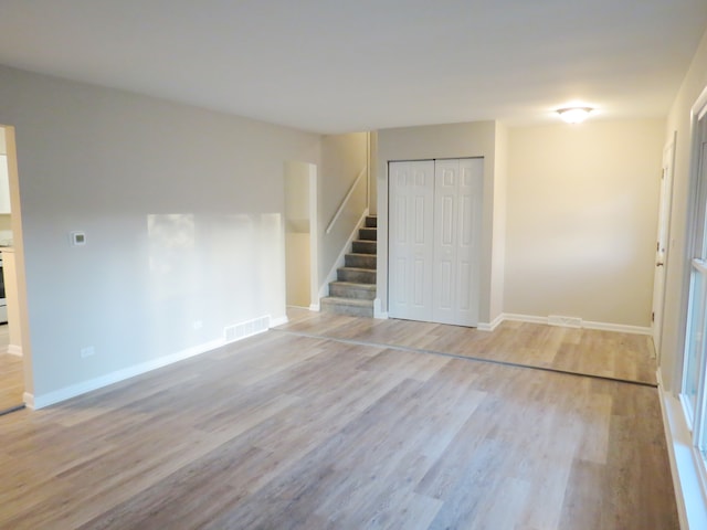 interior space featuring a closet and light wood-type flooring