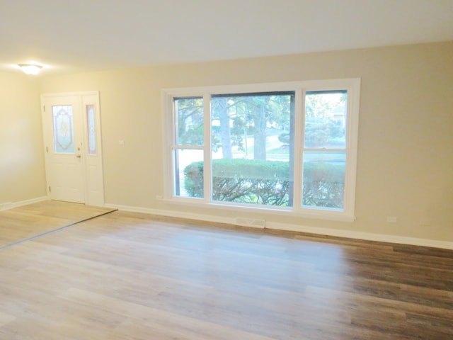 interior space with hardwood / wood-style floors