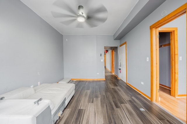 5338 S Wood St, Chicago, IL 60609 - unfurnished bedroom with dark wood finished floors, ceiling fan, and a closet
