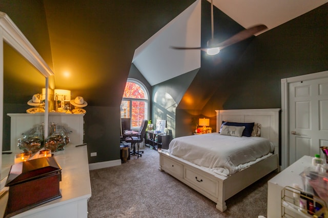 carpeted bedroom featuring vaulted ceiling