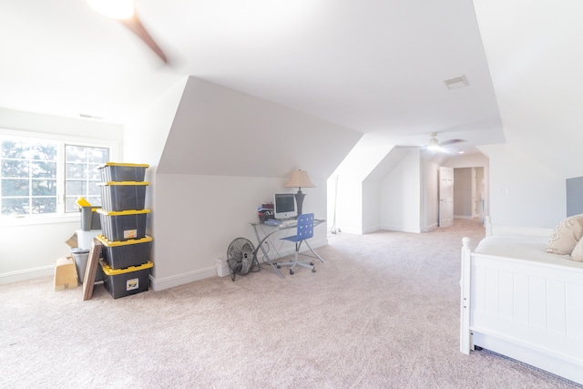 home office with ceiling fan, lofted ceiling, and carpet floors