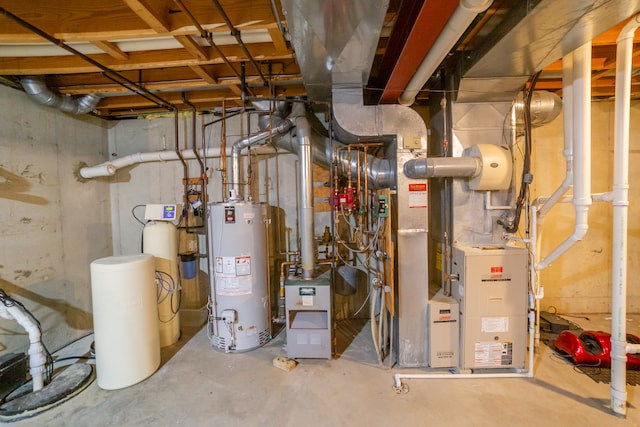 utility room featuring water heater