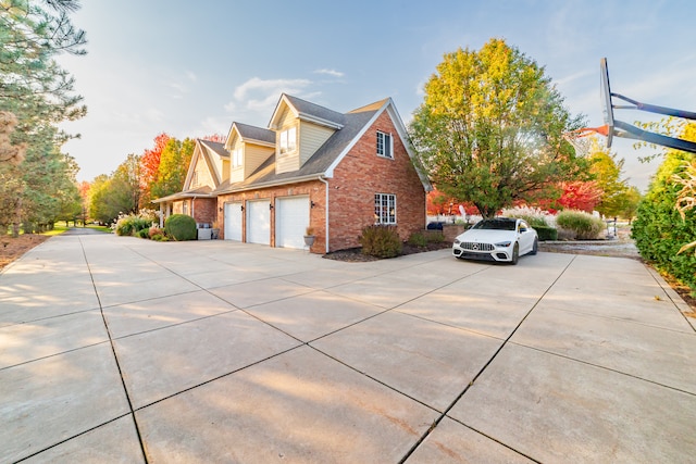 view of side of property featuring a garage