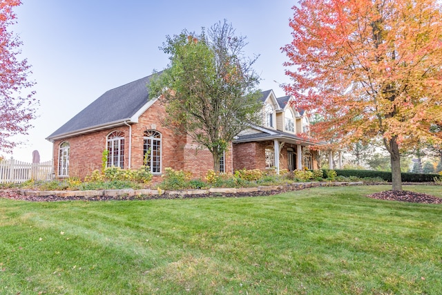 view of front of house with a front lawn