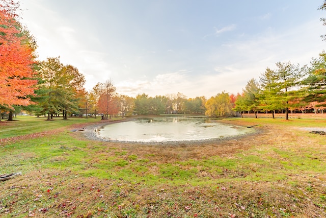 surrounding community with a water view