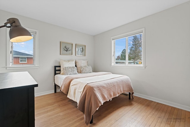 bedroom featuring light wood-type flooring