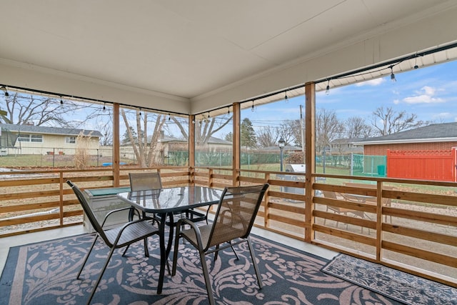 sunroom / solarium with a wealth of natural light